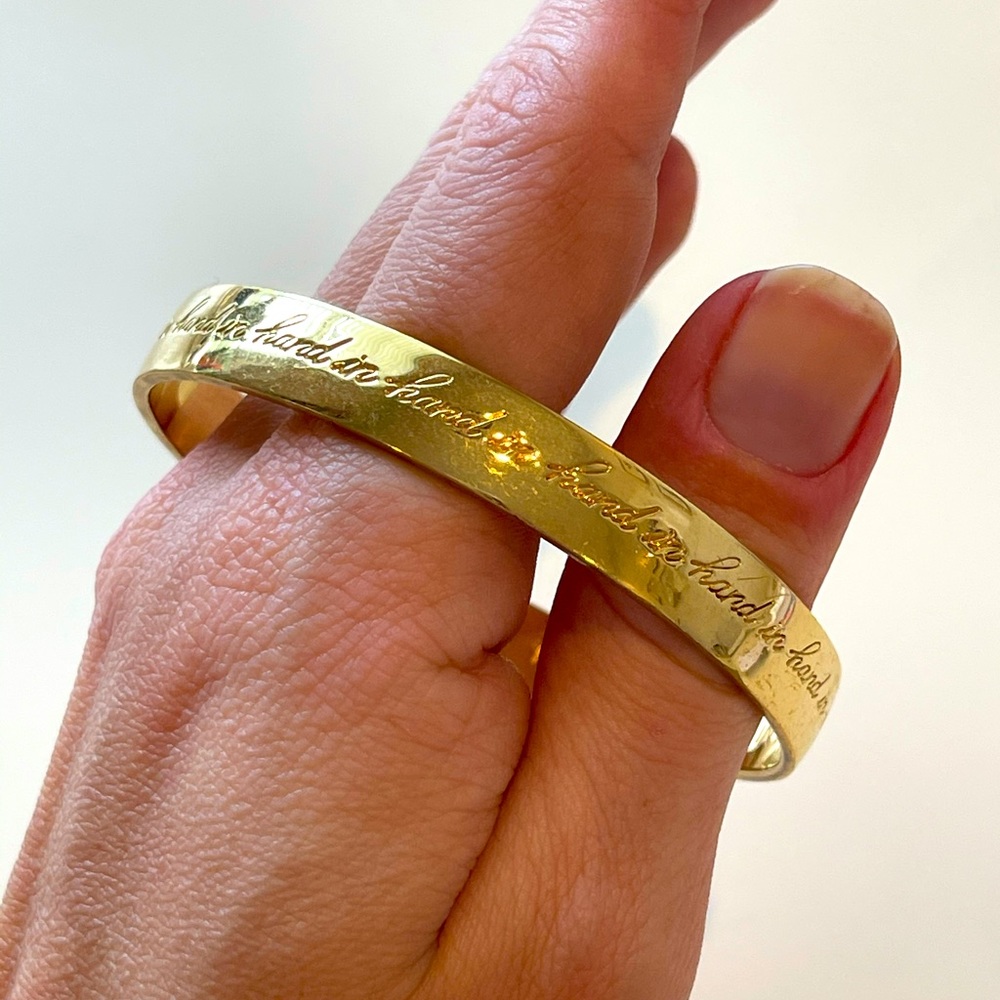 Kate Spade gold bangle “Hand in Hand”